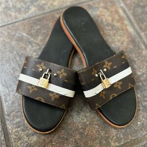 Louis Vuitton Lock It Leather Mules